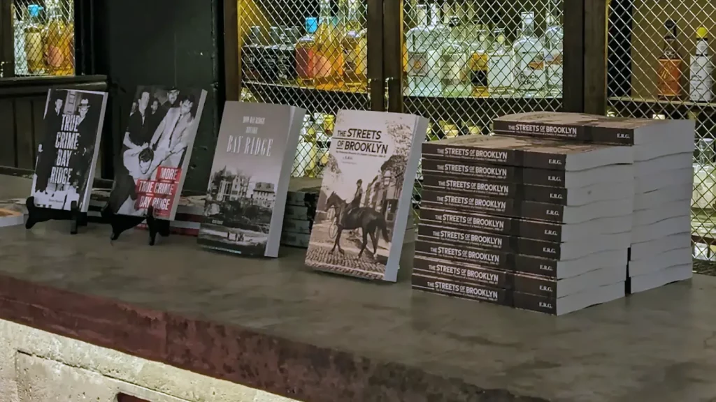 A photograph showing an array of books Henry Stewart has written.